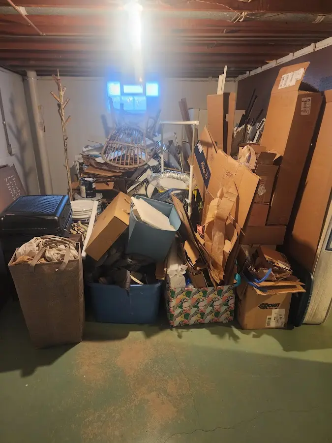 Roll-off dumpster container at job site for Yard Waste Dumpster Rental in Woodbridge